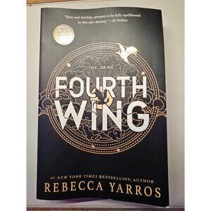 Fourth Wing by Rebecca Yarros in paperback with dragon spine design.